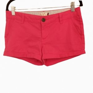 So women's cuffed shorts. Hot pink flat front and cotton size 7